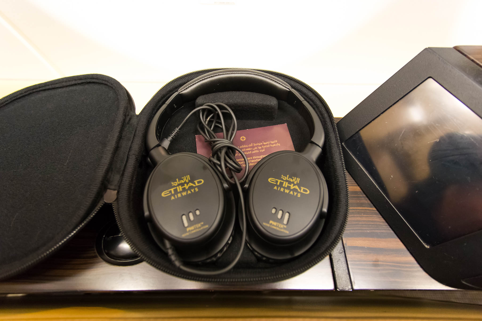 a black headphones in a case